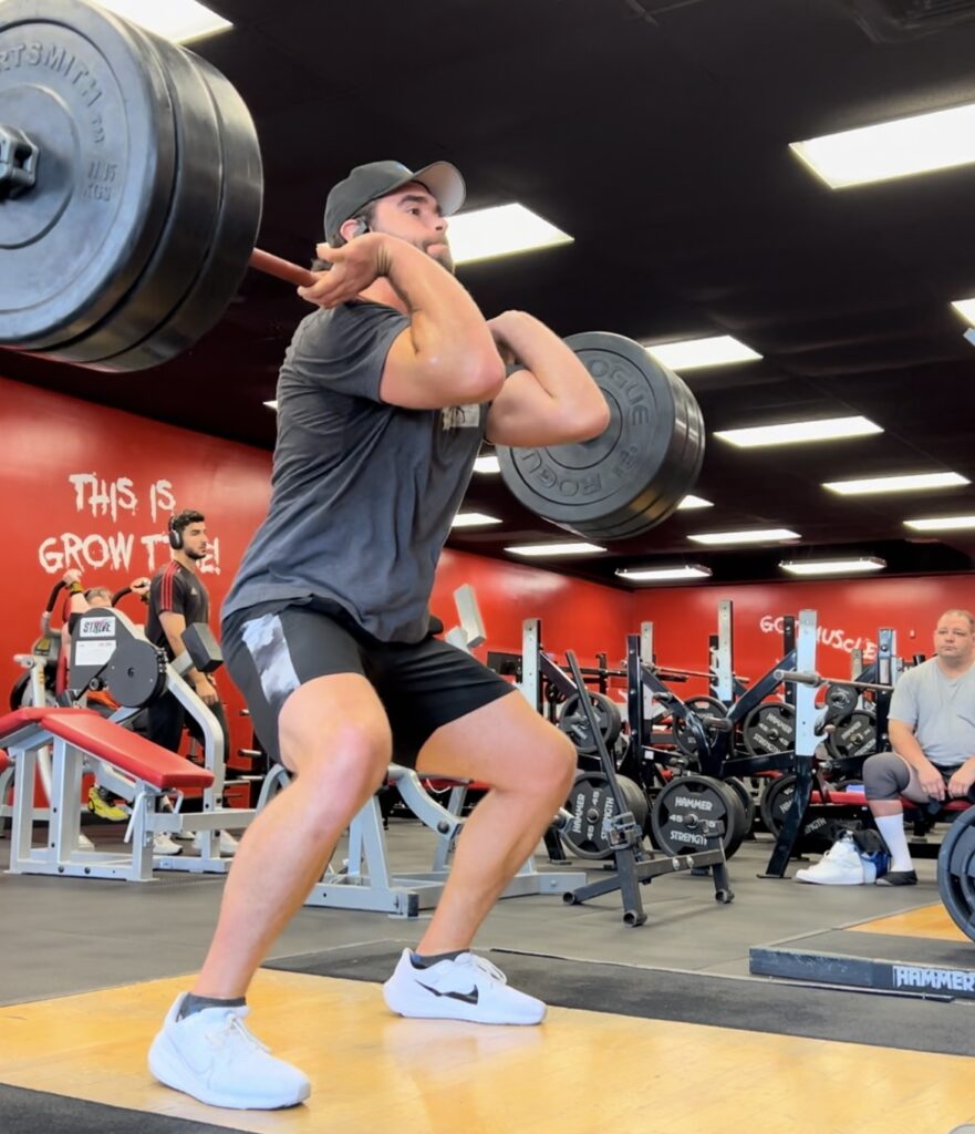 Athlete lifting to improve power